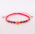 Bransoletka z czarnymi turmalinami i złotą różą